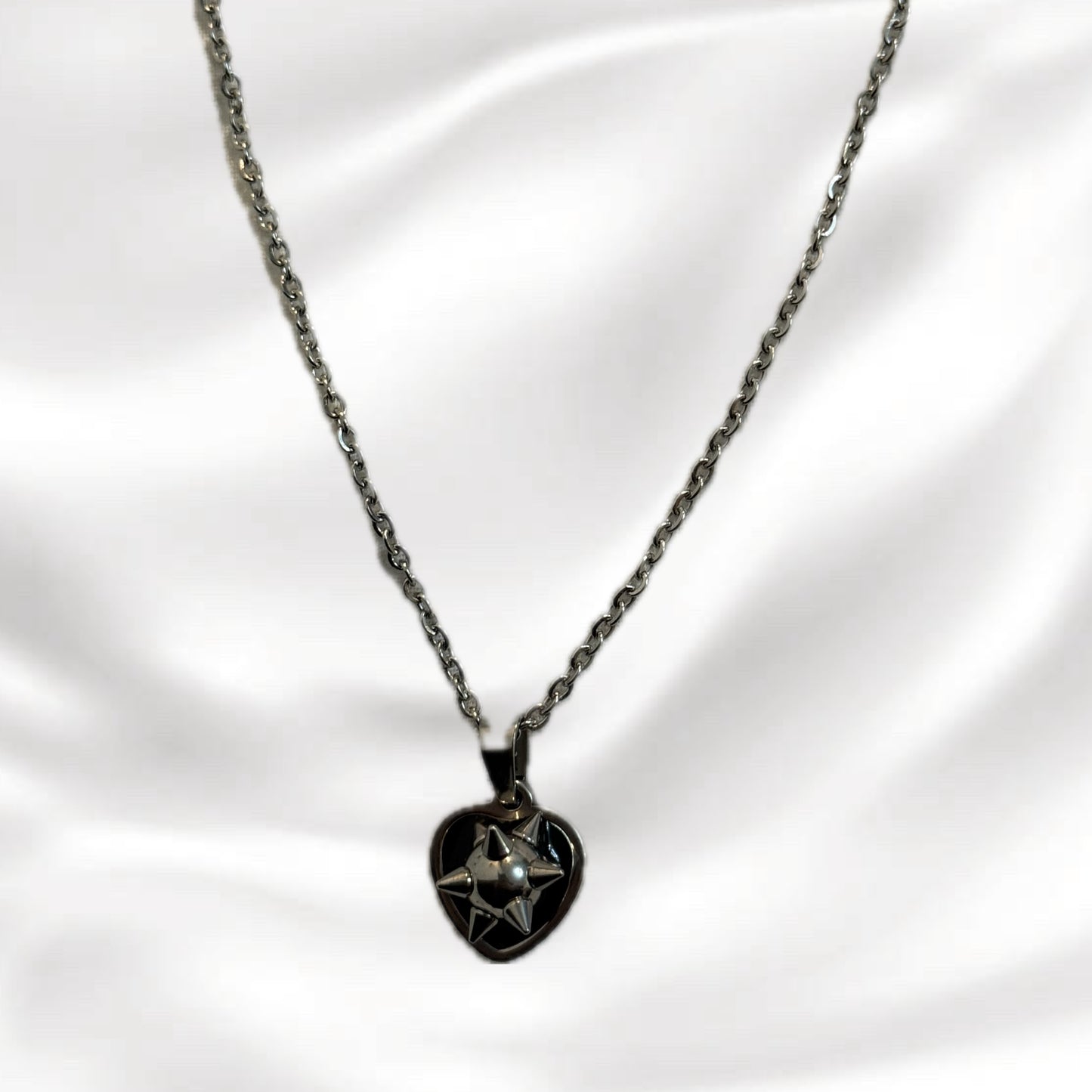 Flail heart necklace