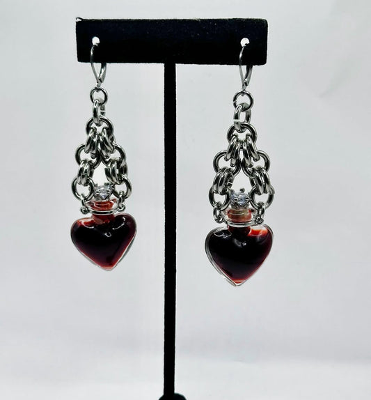 Vampira heart vial earrings